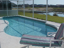 3 bedroom Florida villa swimming pool, facing south, overlooking a lake